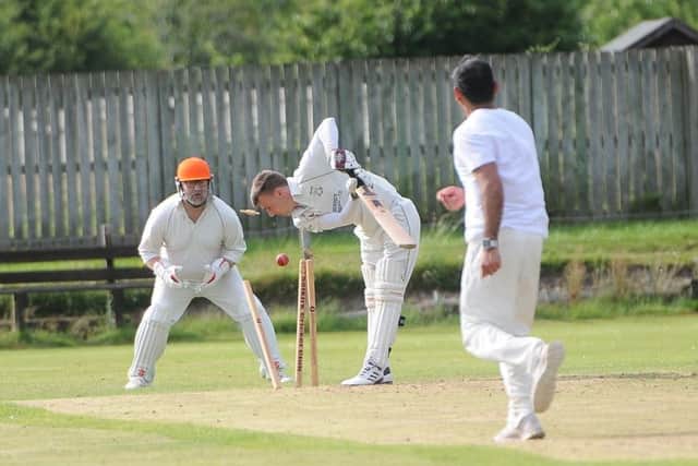 Rocking and rolling stumps as Ian Gardner of Selkirk is bowled (picture by Grant Kinghorn).