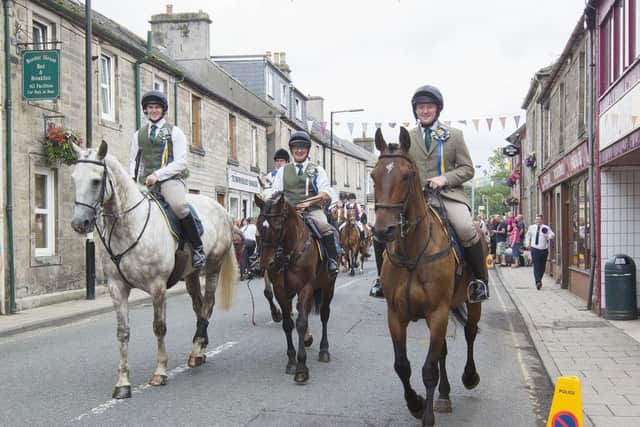 Hawick Cornet Connor Brunton, acting father Joe Crawford and 2018 cornet Gareth Renwick.