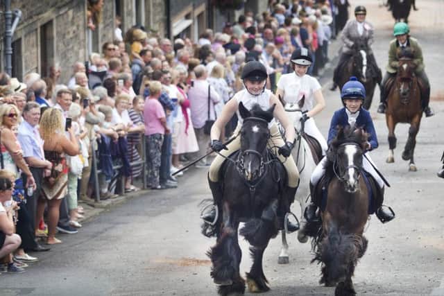 Deni, Cree and Abbie race up the wynd at Langholm.