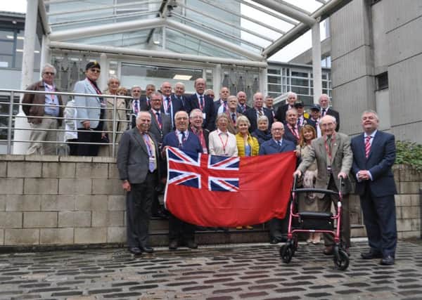 Merchant Navy personnel gather at Scottish Borders Council headquarters for Merchant Navy Day last year.