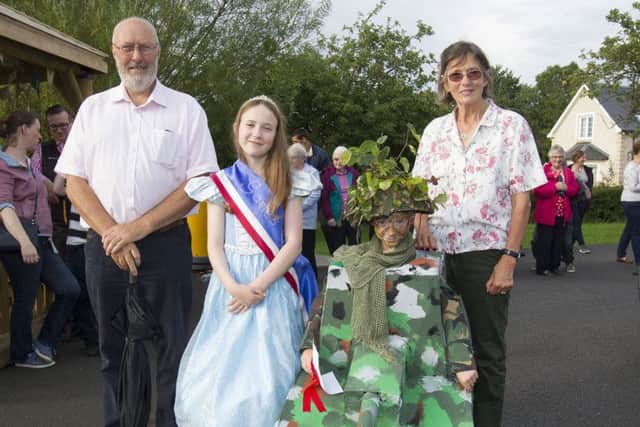 Judges Charles and Mary Simmons with Games Queen Orlaith O'Brien and winner Alec Clelland.