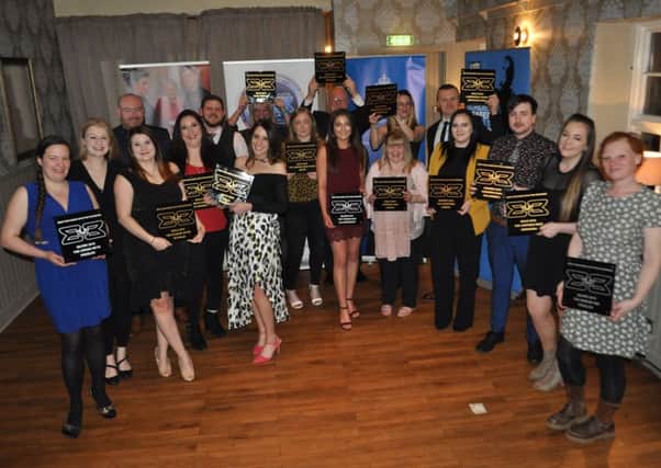 2018's Borders Best Bar None award-winners with their accolades at the Buccleuch Arms in St Boswells.
