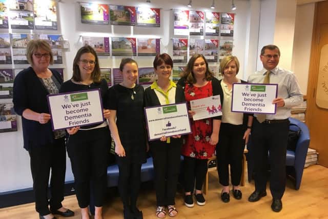 A friend in need is a friend indeed...the team at Hastings Property and Legal signed up to become Dementia Friends and later kindly donated £300 to the D-Cafe in Kelso.