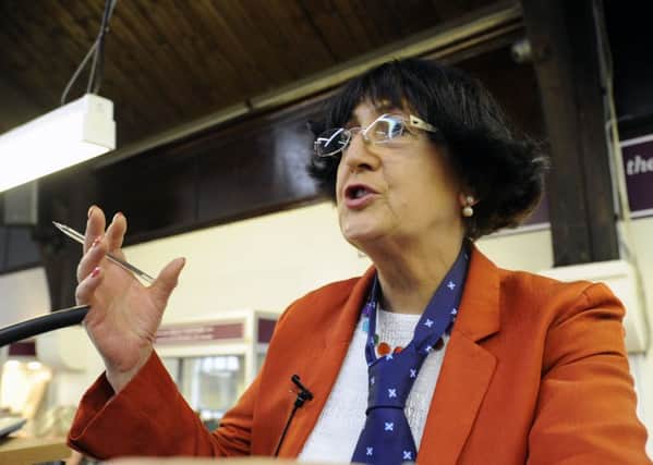 Telly star Anita Manning - not averse to wearing a bunnet herself - will be speaking and conducting the Hatfest auction at the Haining.