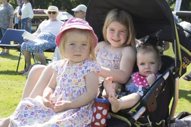 Thousands enjoy the massed pipe bands and dancing displays at Floors Castle.