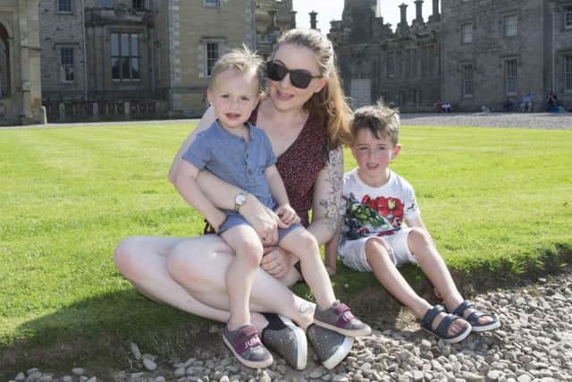 Thousands enjoy the massed pipe bands and dancing displays at Floors Castle.