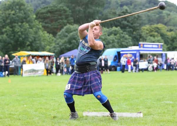 Neil Elliot throwing the hammer at Peebles Highland Games in 2016.