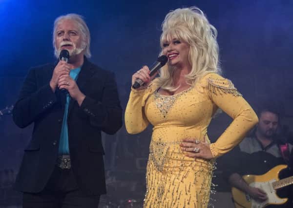 Andy Crust and Sarah Jayne impersonating Kenny Rogers and Dolly Parton.