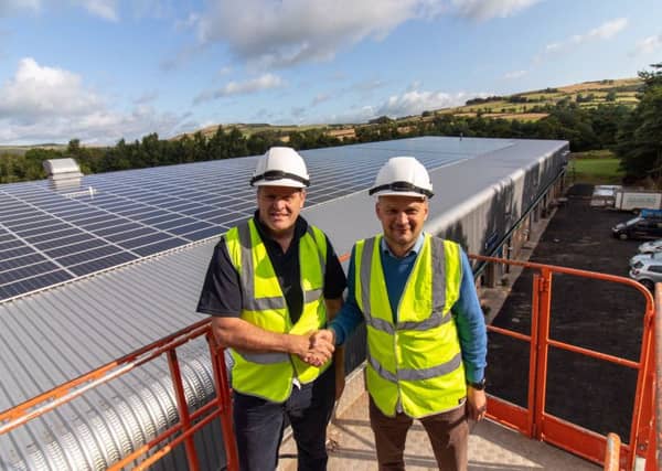 Cameron Crawford of JSC Estates and Brian Middleton of Renew Green Energy check out the installation.