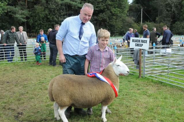 Alan and James Cowans of Philiphaugh with the overall winner.
