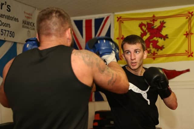 Sean Gentleman working the pads with twice world champion bare knuckle boxer Luke Atkin