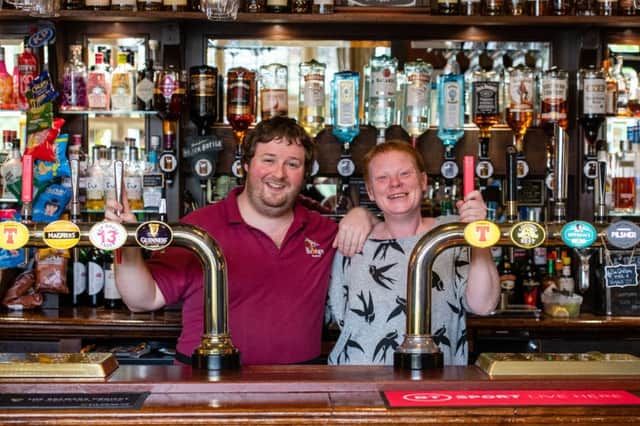 Manager Nikki Cassidy and barman Hamish Crawford at the Bridge Inn in Peebles.