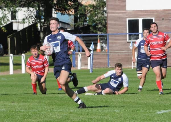 Ryan Cottrell speeds away to score Selkirk's first try of the afternnon against Aberdeen Grammar (picture: Grant Kinghorn)