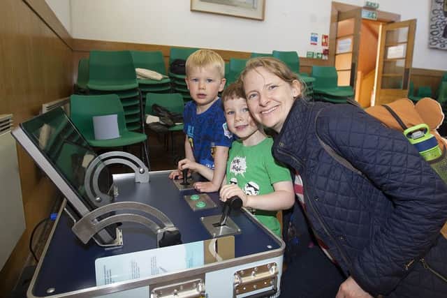 Joseph, Cameron and Lynne Bain drilling for oil at Melrose.