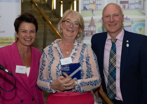 Jedburgh's Georgiana Craster collects her Paths for All award.