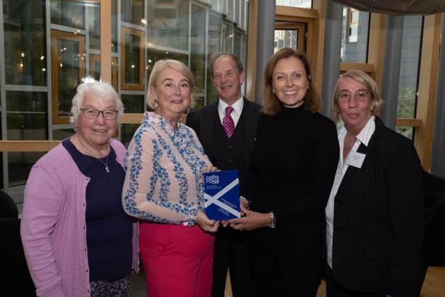 Jedburgh's Georgiana Craster collects her Paths for All award.