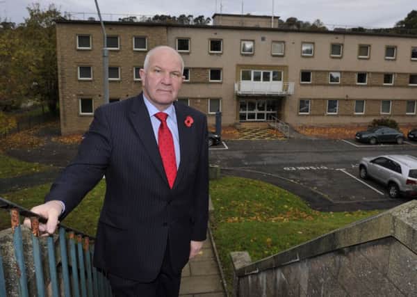 Councillor Watson McAteer outside Hawick police station.