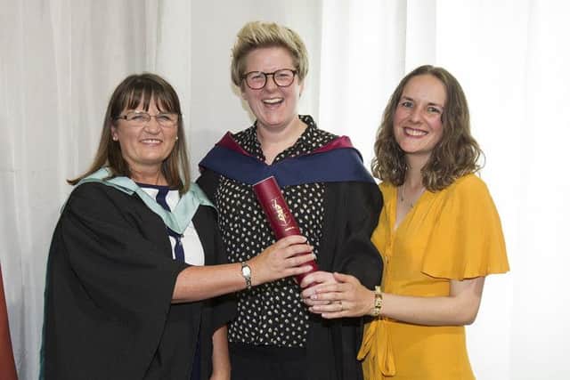 Borders College vice-principal Heather Anderson congratulates Amy Brydon on her SVQ 3 in management with wife Kirsty Brydon.