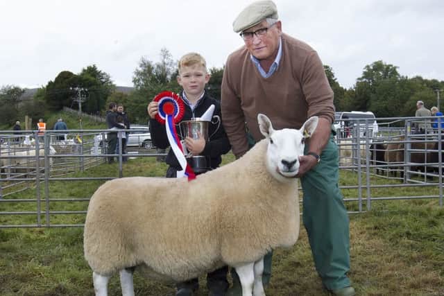 Overall Champion Sheep of Yetholm Show was won by Jim Thomson from Kelso Cleugh with his North Country Cheviot Park Type Ewe, pictured with his grandson Handler Liam