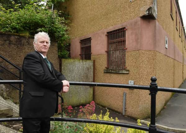 Councillor Davie Paterson outside the old Glenmac mill in Hawick.