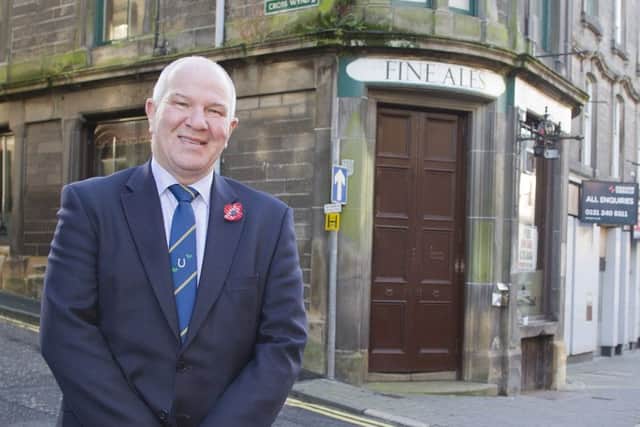 Councillor Watson McAteer outside the old Queen's Head pub in Hawick.