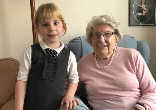 Katie Crichton, the youngest P1 pupil at Burgh Primary School in Galashiels, and Agnes Hogarth, one of the school's oldest living alumni.