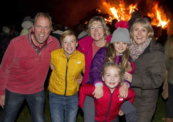 Craig family from Denholm, Robert, George, Jenny, Hannah, Emma, Caitlin and Olivia enjoying the bonfire before the firework display.