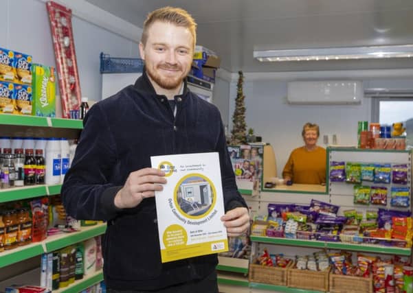 Jack Lowden with Francois de Plessis at Oxton Community Shop.
