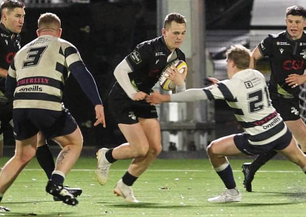 Southern Knights, in the dark kit, in action earlier this season against Heriot's (archive picture by Douglas Hardie)