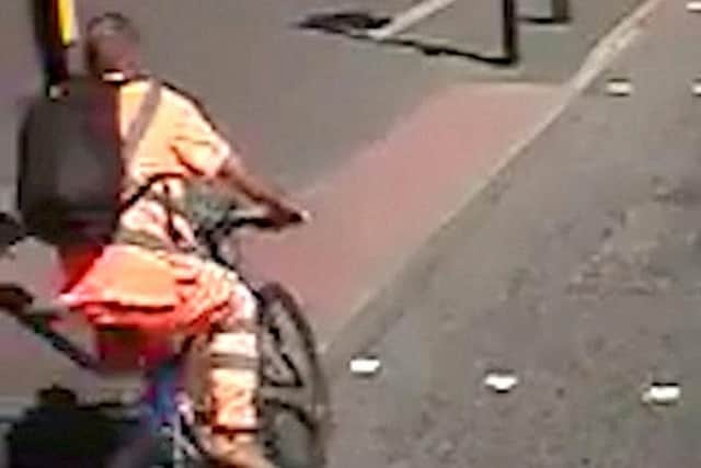 Dashcam footage shows cyclist running a red light - then crashing into ...