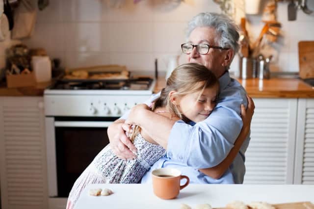 Grandparents shouldn’t hug and kiss their grandkids yet - even if they’ve had two Covid vaccine doses (Photo: Shutterstock)